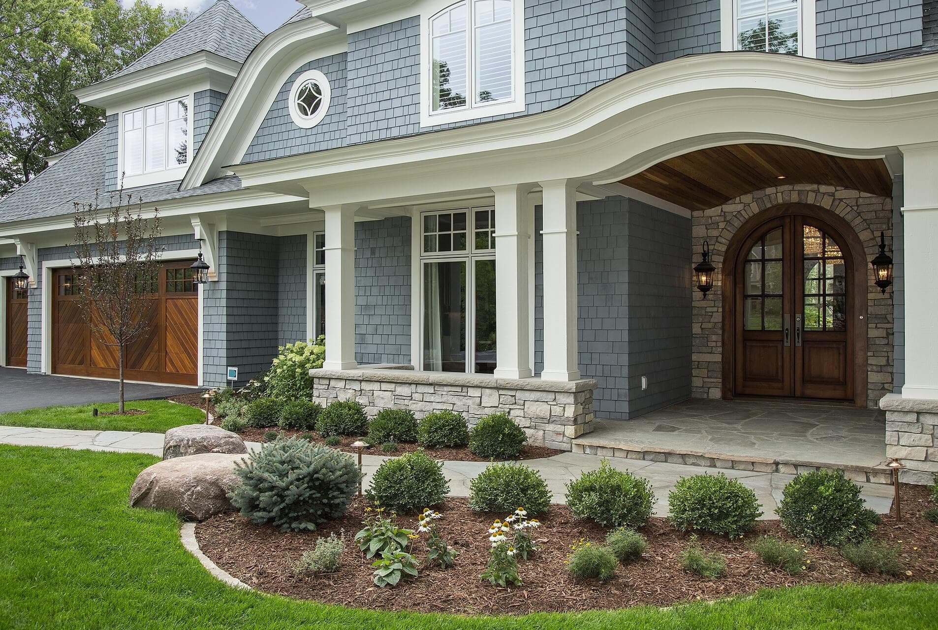 United Brothers Landscaping team installing hardscaping in Wayzata, Minnesota